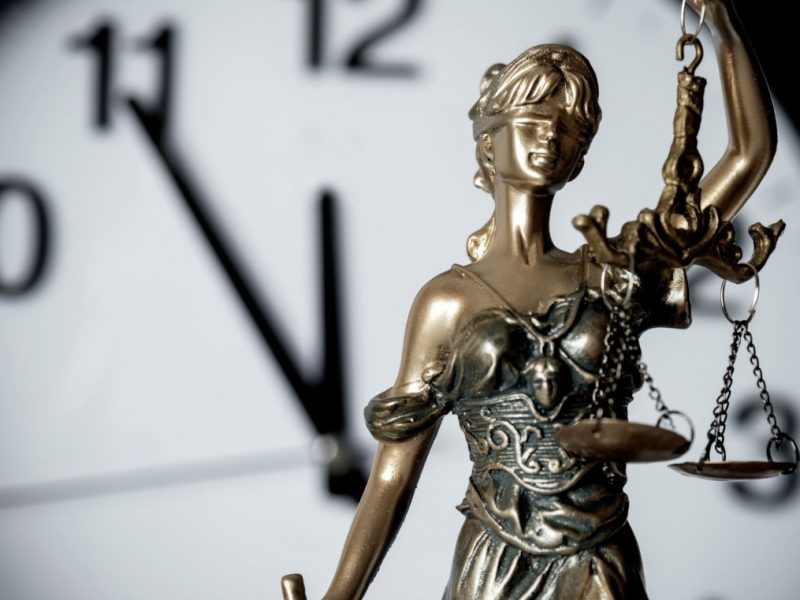 Clock and lady justice.